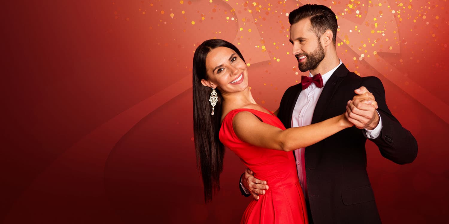 Young couple dancing for the holiday season